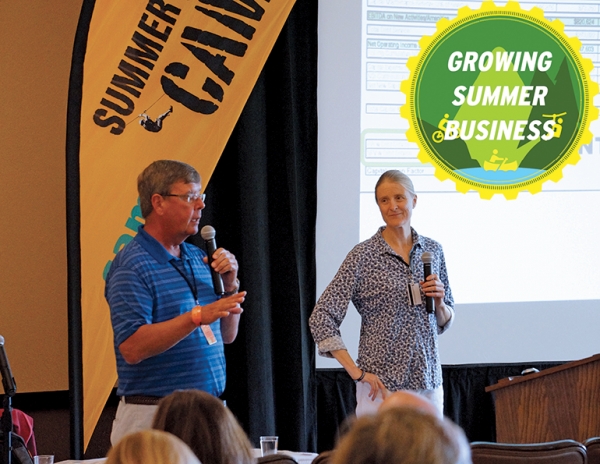 Greg Goddard, left, of Gunstock, N.H., and Claire Humber of SE Group talked about the resort’s summer business planning process at SAM’s Summer Ops Camp 2015 in Camelback, Pa., last September.