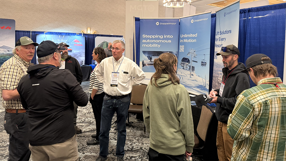 Attendees Gather Around The Doppelmayr Booth