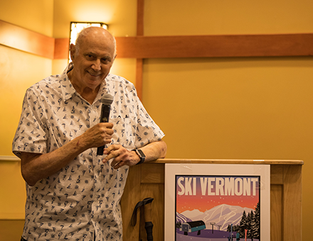 Longtime Smugglers Notch owner Bill Stritzler speaks after being honored with the Ski Vermont Industry Achievement Award
