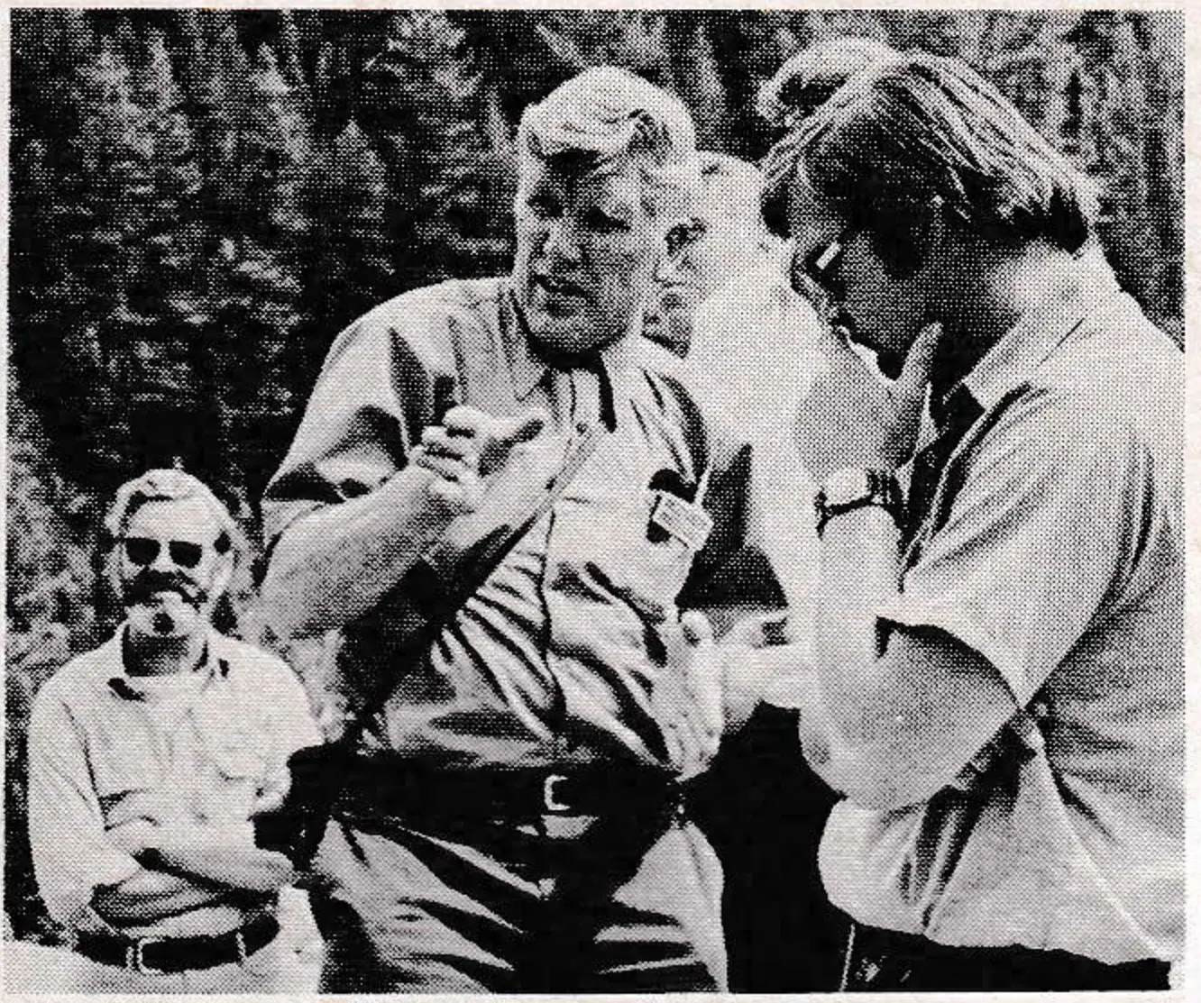 Field leader Rudolph Becking points out slope properties at Aspen meet.