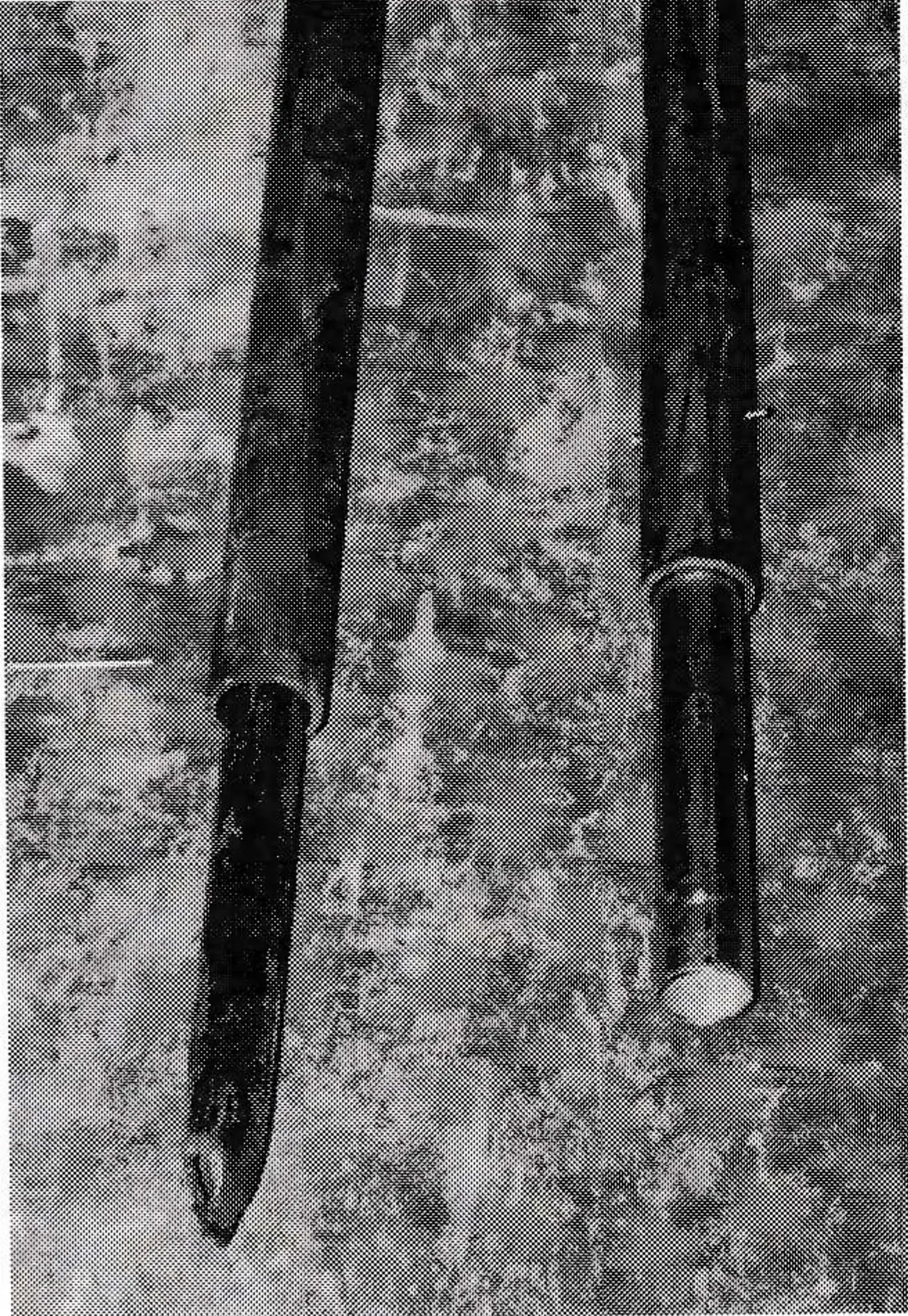 Left is steel pipe with pointed end inserted in plastic tube; right is conduit sleeve inserted in plastic.