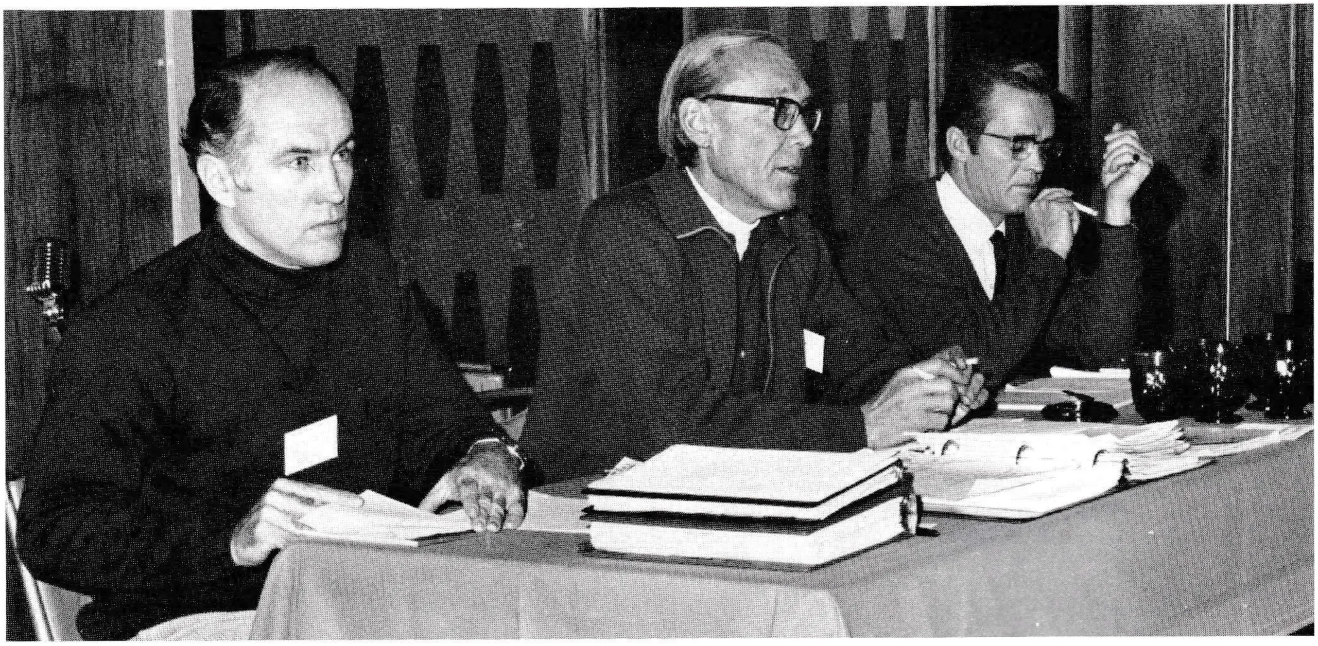 Steve Bradley (center), NSAA executive director of Winter Park, makes the opening remarks at the mid-winter meeting. Seated with him is Dick Garis (left), executive secretary, and Harvey Clifford (right) who is NSAA treasurer and president of Stratton Mt.