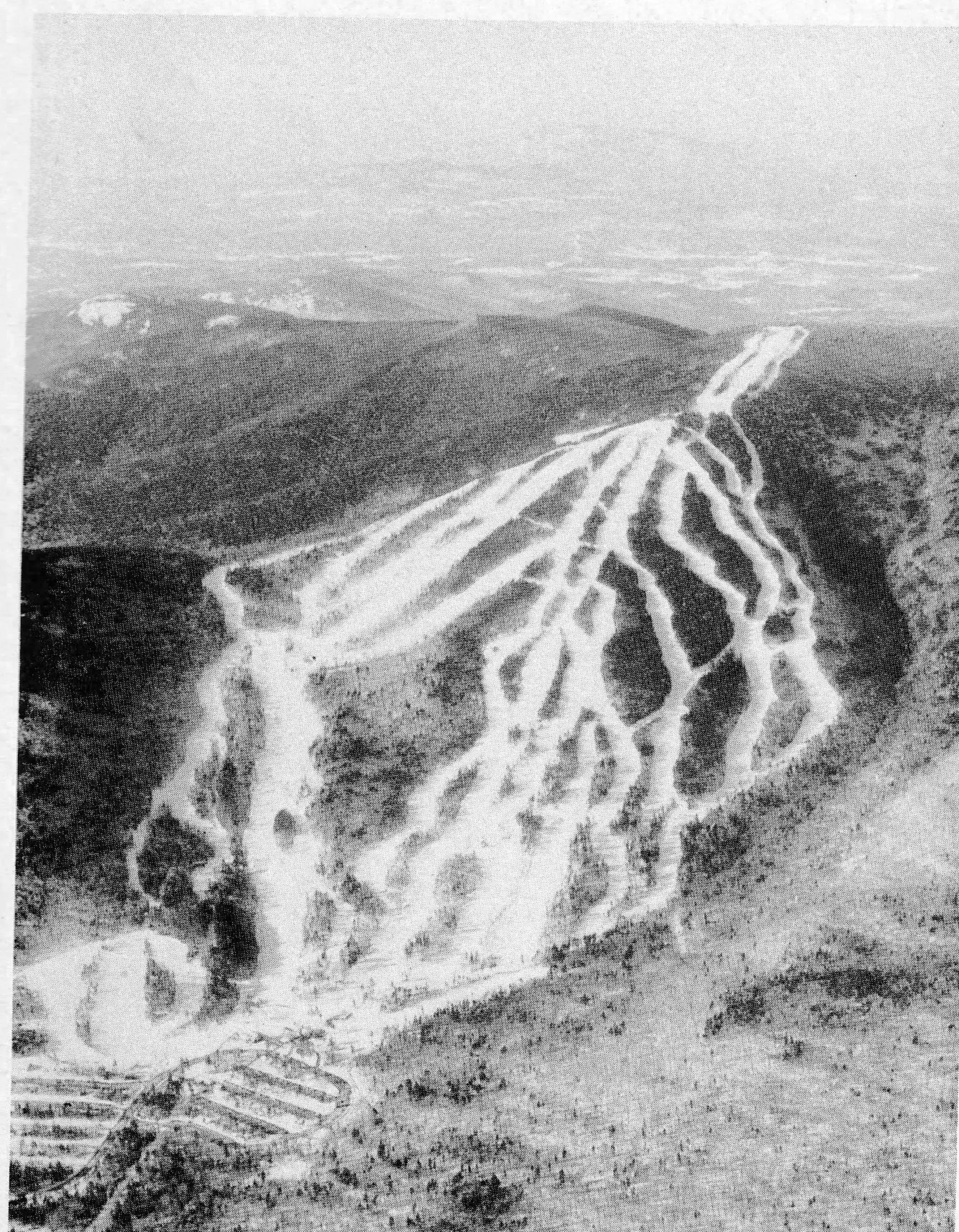 Watershed experiments are not directly applicable to ski trail cutting, but they do provide some clues about streamflow changes. Typically, at areas like Waterville Valley, N.H. (shown), trails occupy about 20 per cent of the total watershed.