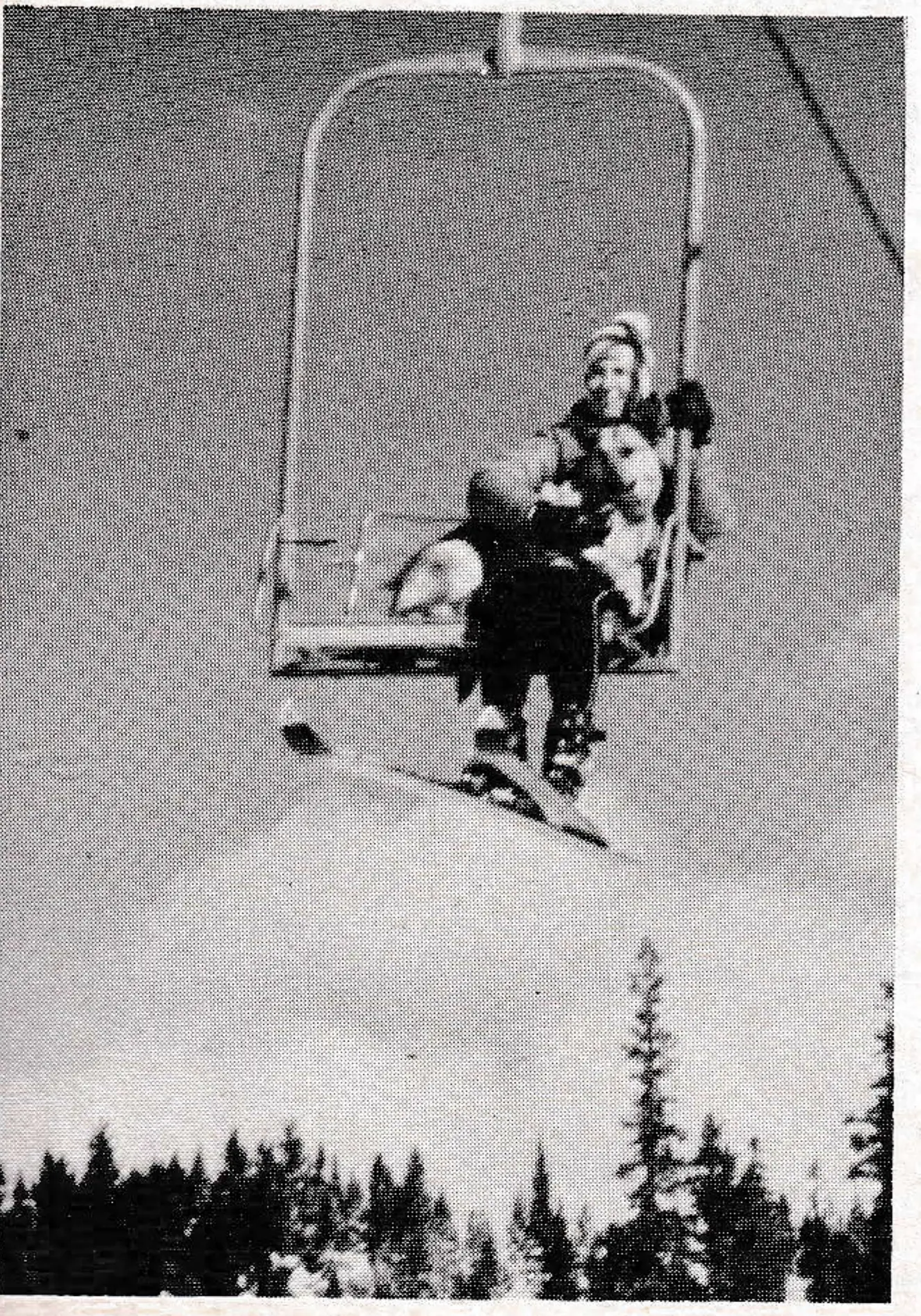 Denise Long and Telly ride the lift at Heavenly Valley