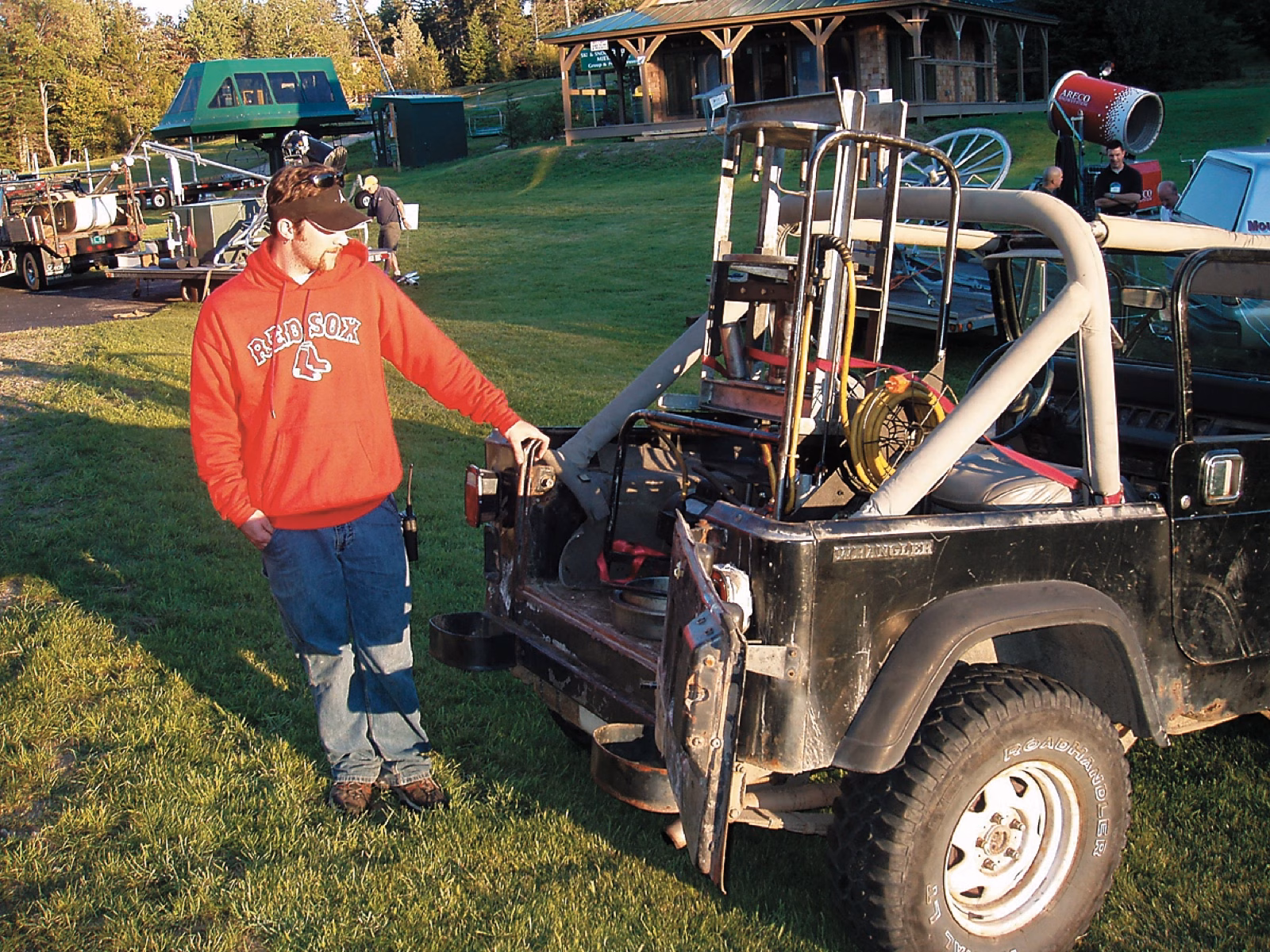 Sheave press rigged on the back of a Jeep