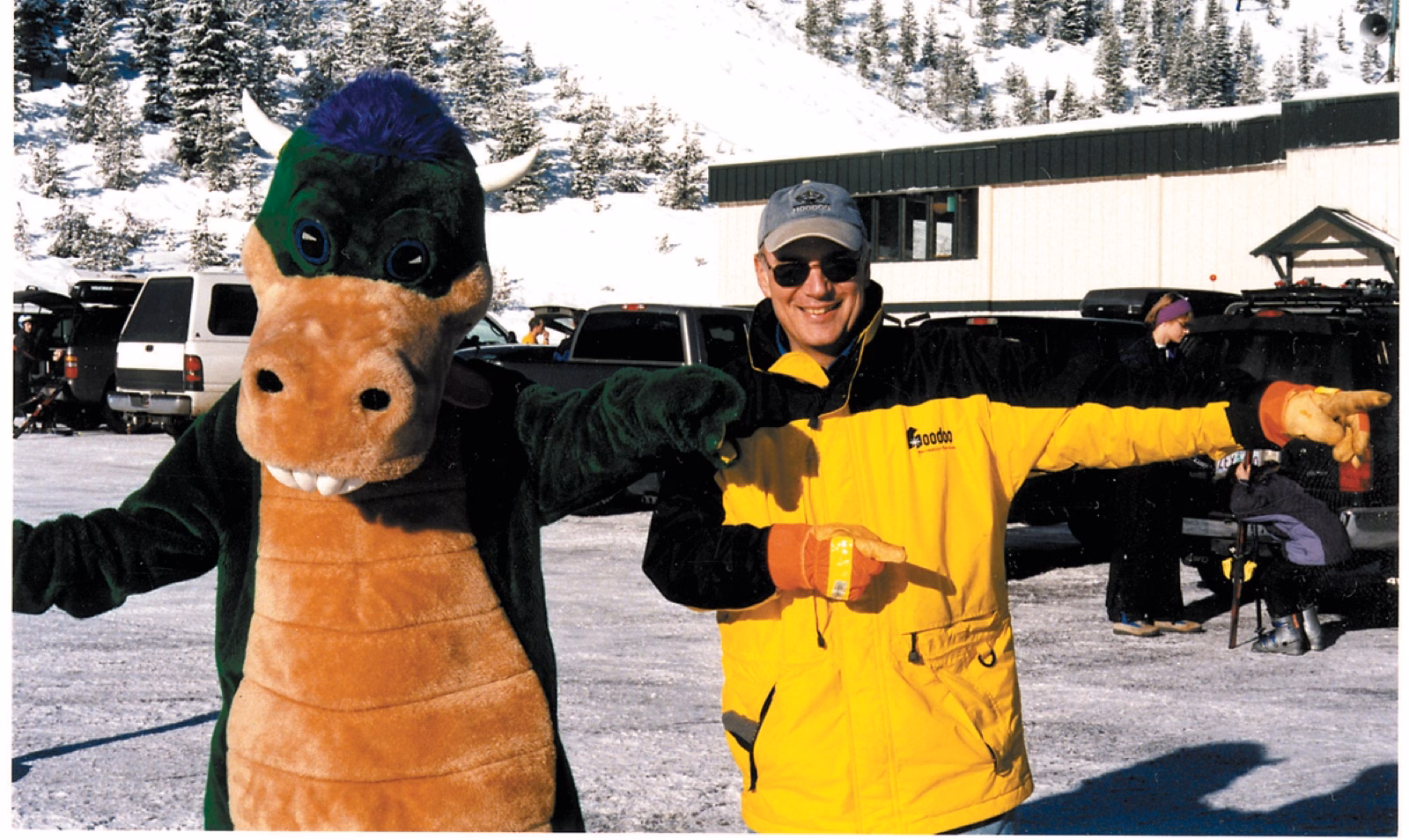 Hoodoo owner Chuck Shephard with a costumed mascot in the parking lot