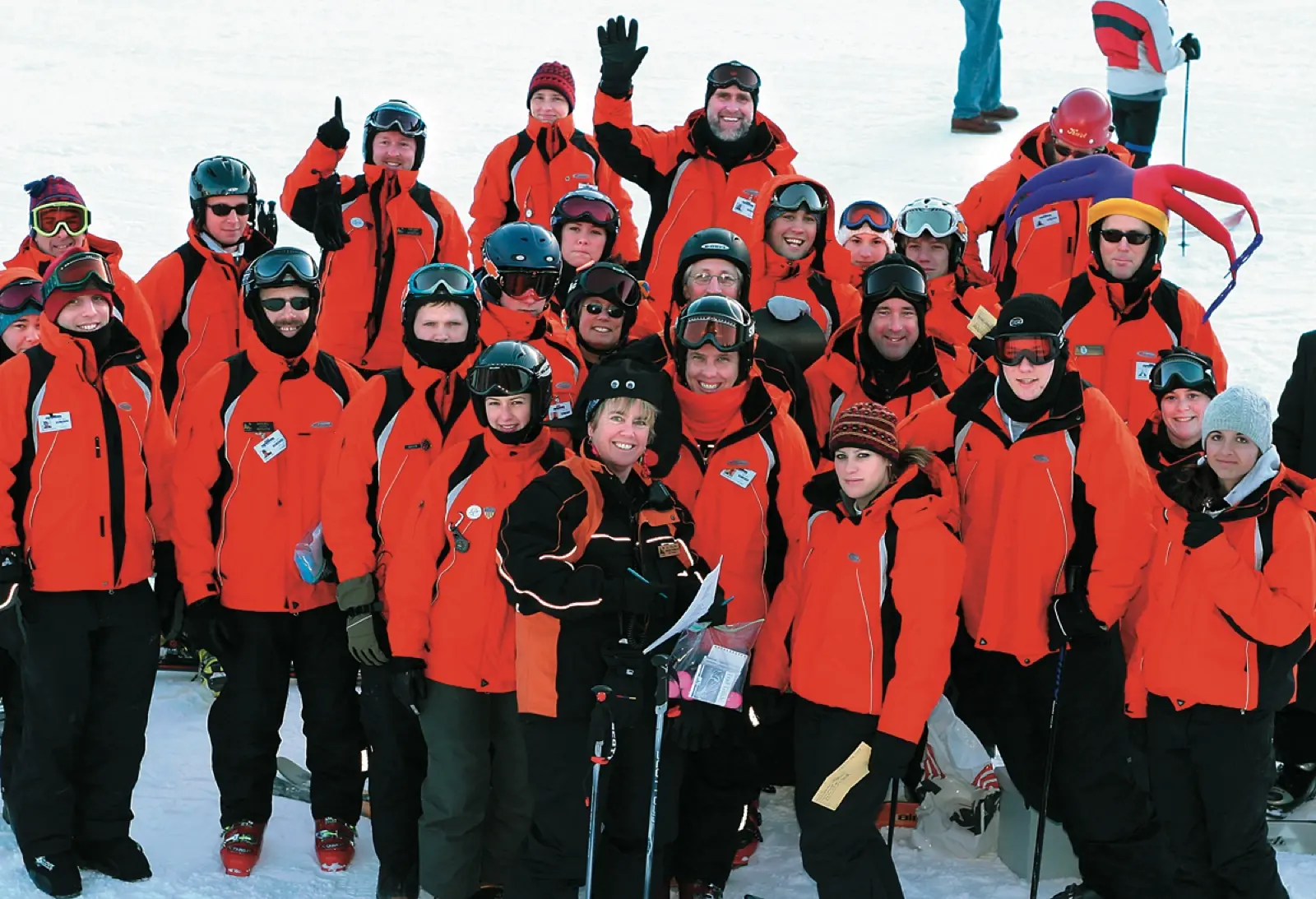 Group of Ski Sundown instructors in red jackets