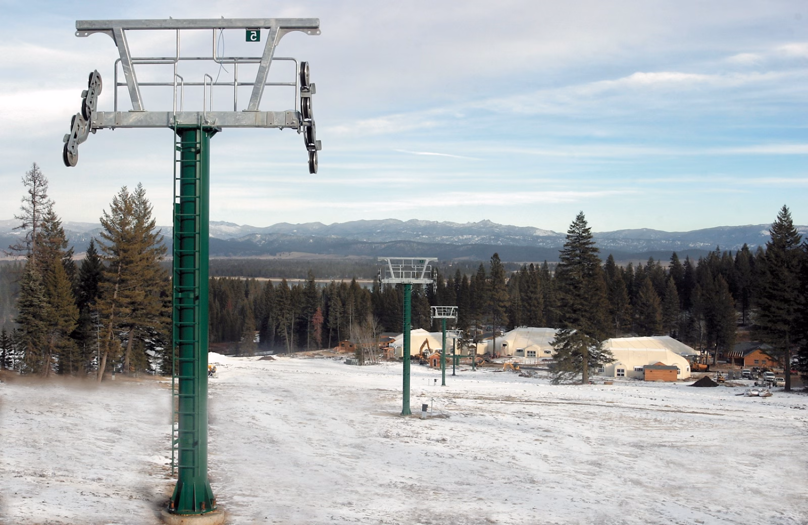 Lift tower above the base area with Sprung Structures in the distance