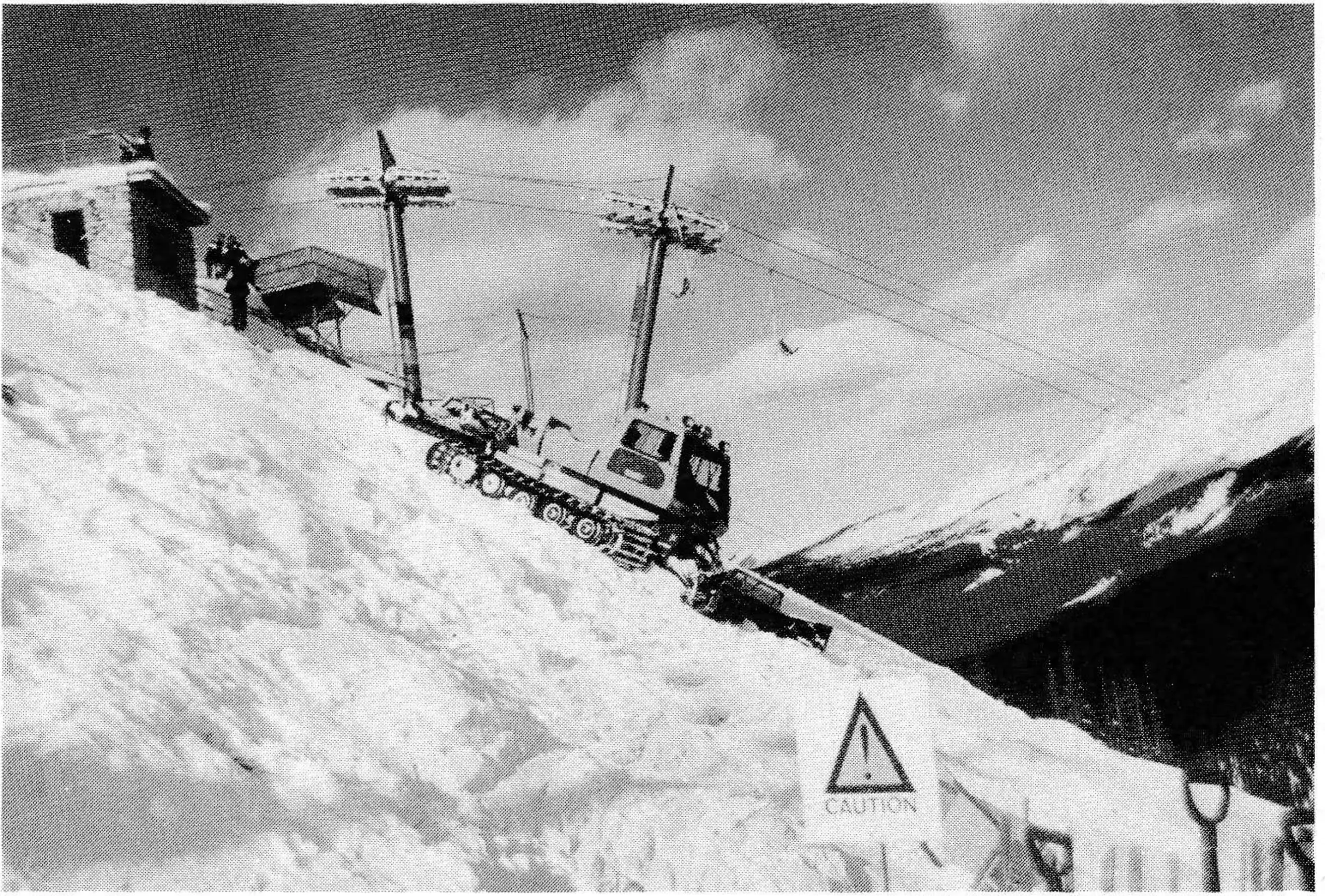 Winch vehicle starts down the slope on an extra-long cable that connects to another vehicle on a different slope. Photos by Dave Dellow.