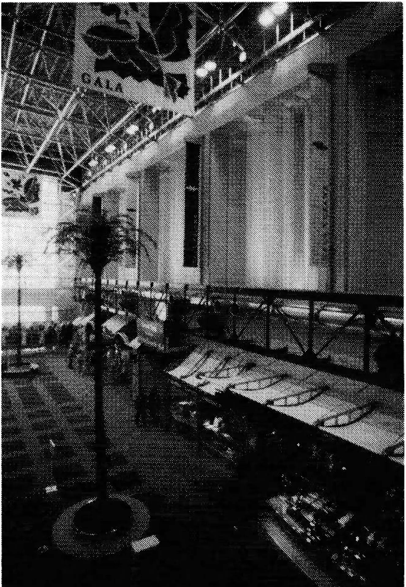 Inside Gala's base lodge with a line of boutiques under skylighted ceilings.