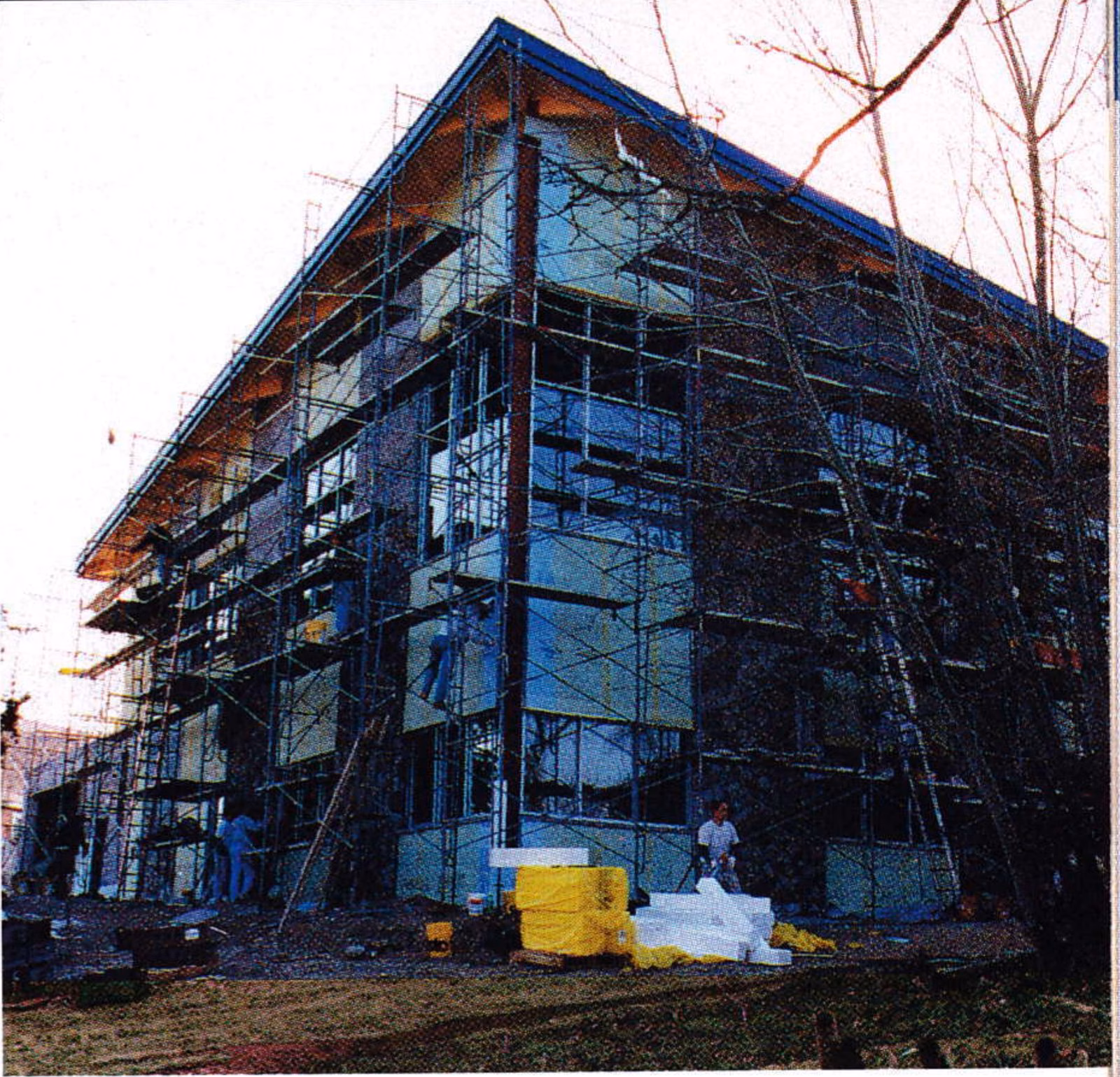 New two-story day lodge wrapped in scaffolding at Cascade Mountain