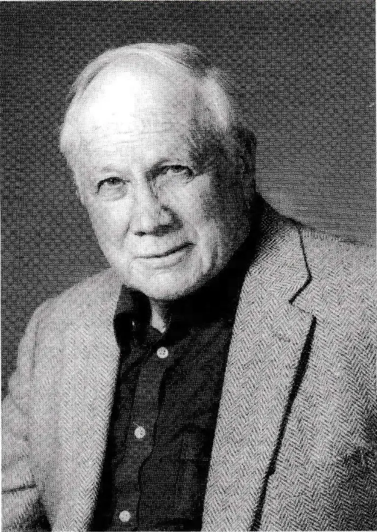 Portrait of Bob Heron in a tweed jacket