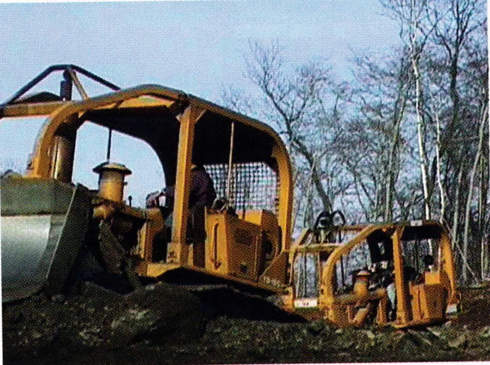 Bulldozer excavating the new summit reservoir at Brodie Mountain