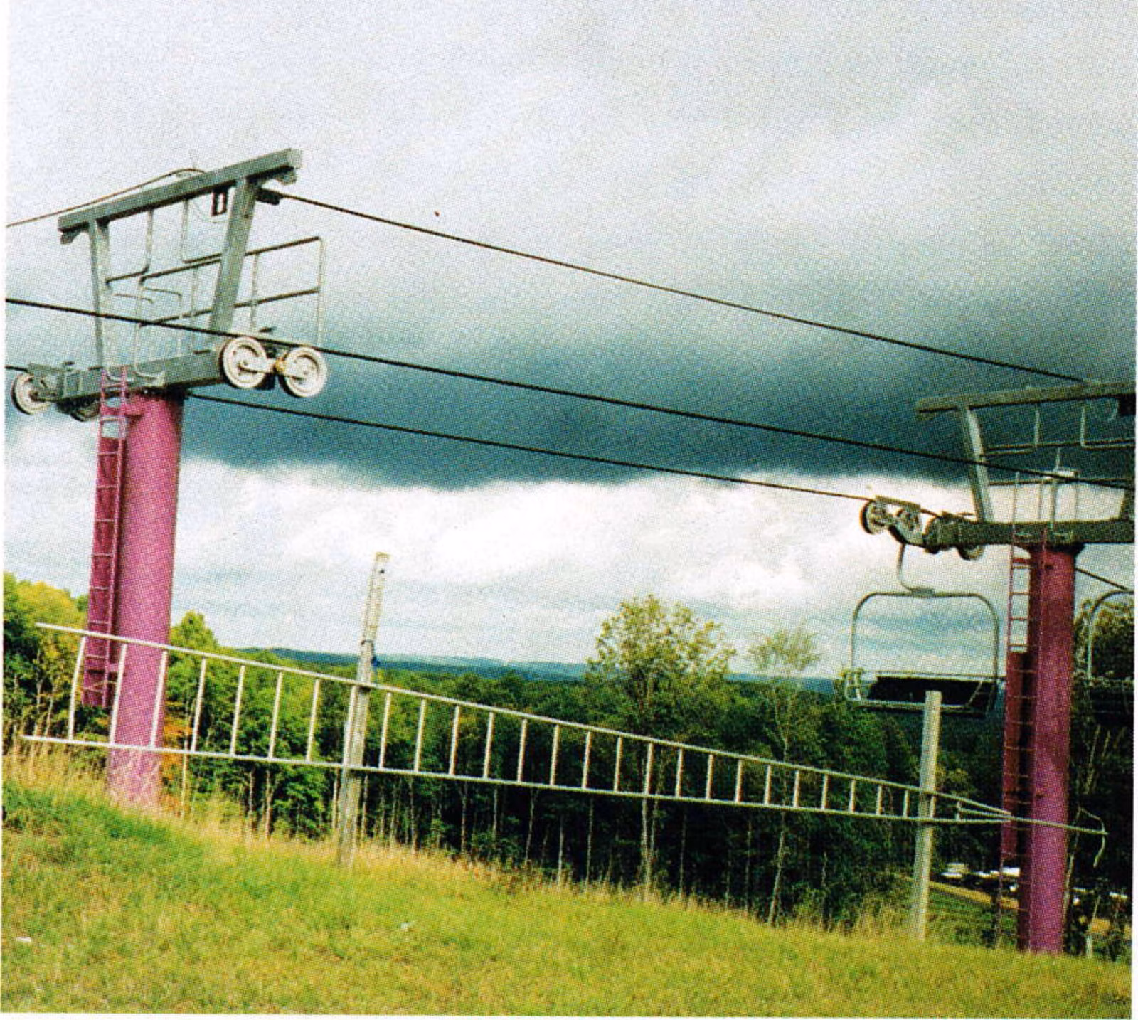 Quad chairlift at Shanty Creek, where apple picker ladders are used for evacuation