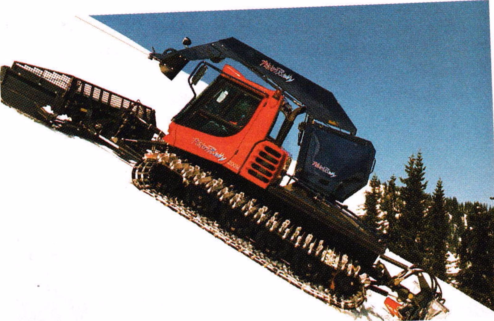 Red Pisten Bully PB200W winch groomer with winch boom on a steep snow slope