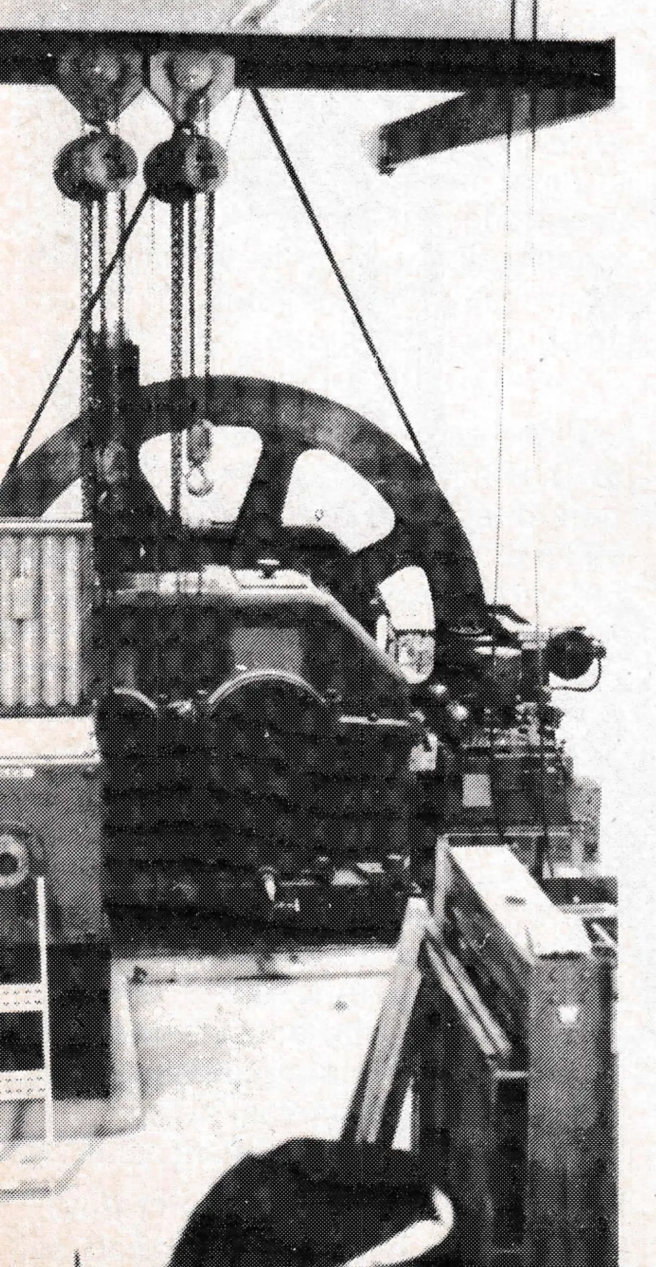 The Engine room installation in progress showing 550 KW drive motor, main helical gearbox and drive bullwheel for Section I. To the right of the gearbox is the brake control unit and the auxiliary drive gearbox can be seen behind the bullwheel.