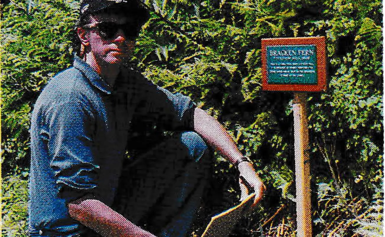 Steamboat's Mike Bieron shows off one of the interpretive signs on nature trail.