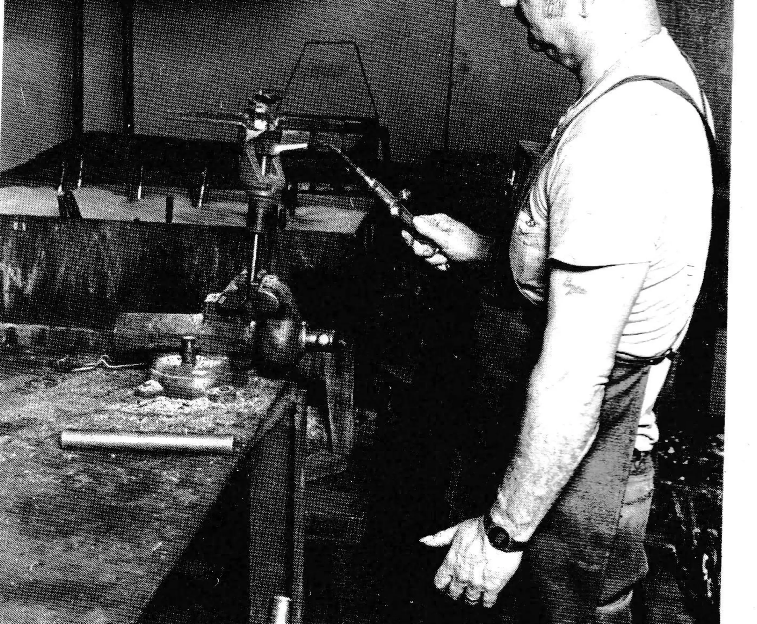 Heat being applied to stud to soften the bonding agent prior to disassembly.