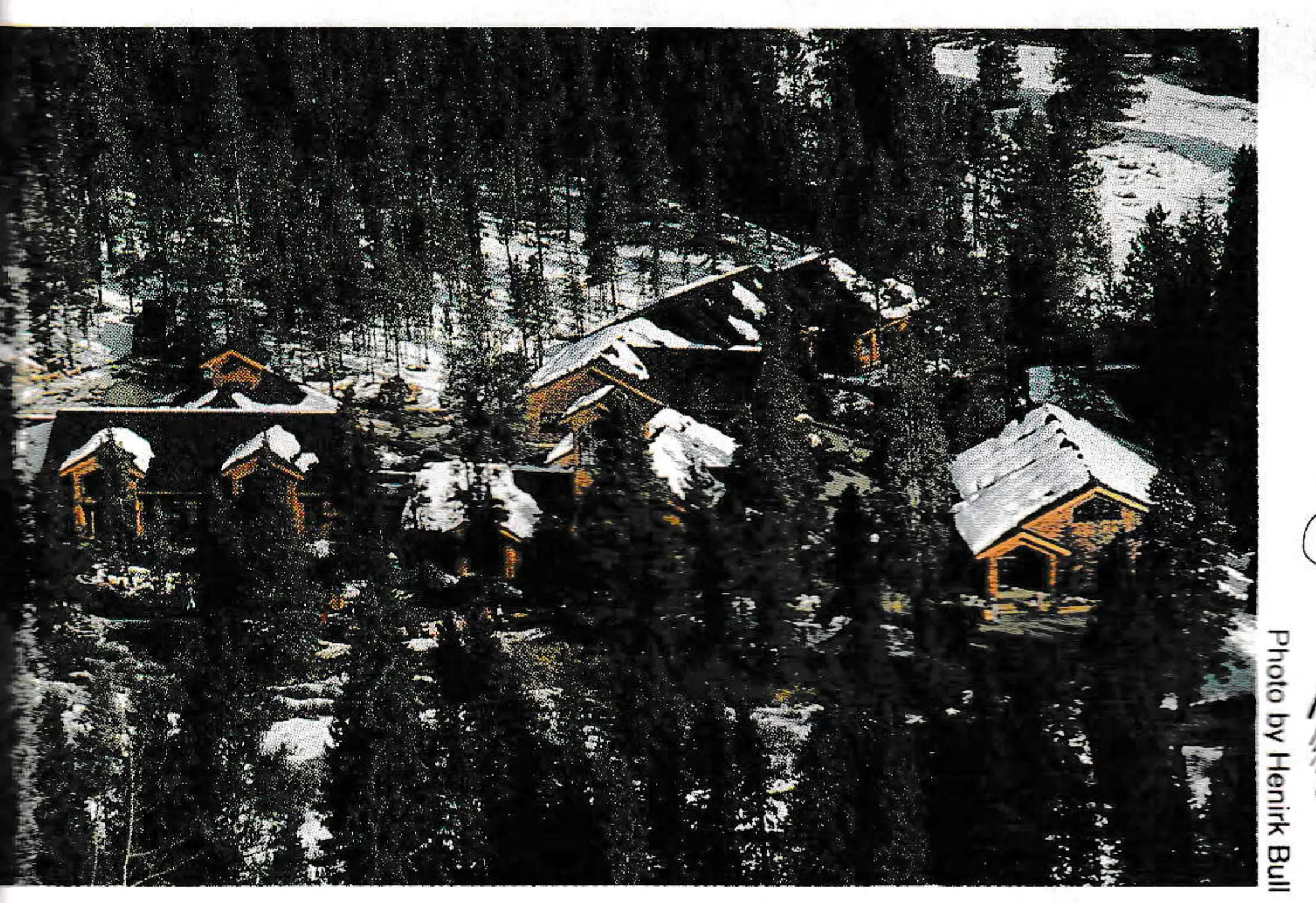 At Keystone,'s River Run Plaza, base lodge functions have been divided into separate, smaller buildings to project a small-scale, preserve tree masses and minimize interior circulation space. The six buildings were sited across the river from the gondola, rather than at its base, to provide better sun and mountain views. The services were arranged in a logical flow: skiers coming from the parking lot arrive first at the ticket office and ski shop, then pass the ski rental shop before heading to the lift. Skiers coming off the mountain can go straight to restrooms and the cafeteria. Approximately a third of the total space in the complex is devoted to food service. The architectural style of River Run's single-story buildings is simple and rustic. Pitched roofs with gables direct snow and melt water away from entries; all natural wood shingles and trim blend into the forest. Building cost were approximately $110 per square foot. Architects were Bull Volkmann Stockwell of San Francisco. Photo by Henrik Bull