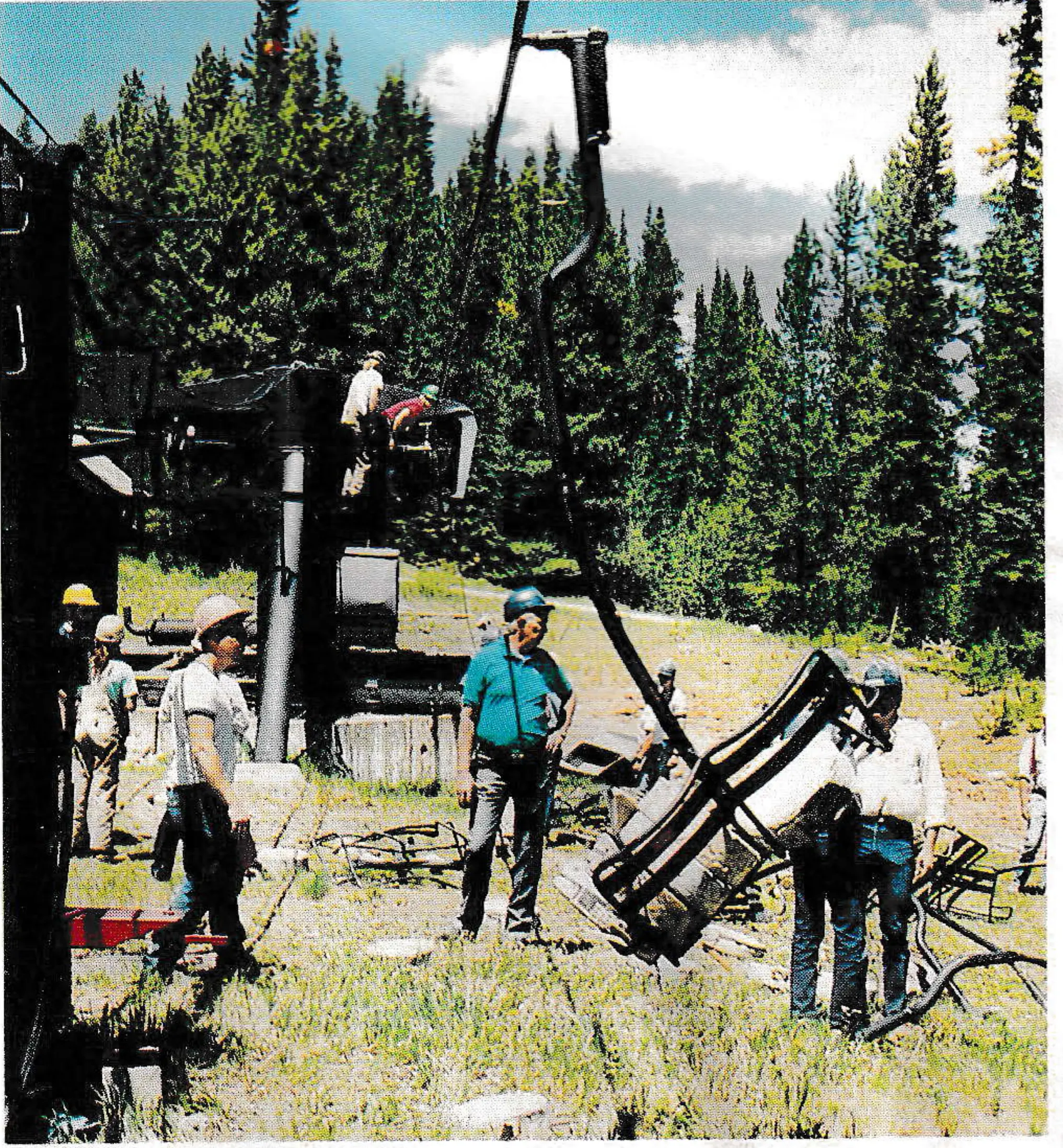 Jerry Groswold, president of Winter Park, surveys damage following rollback — here, a chair passed around the bullwheel.
