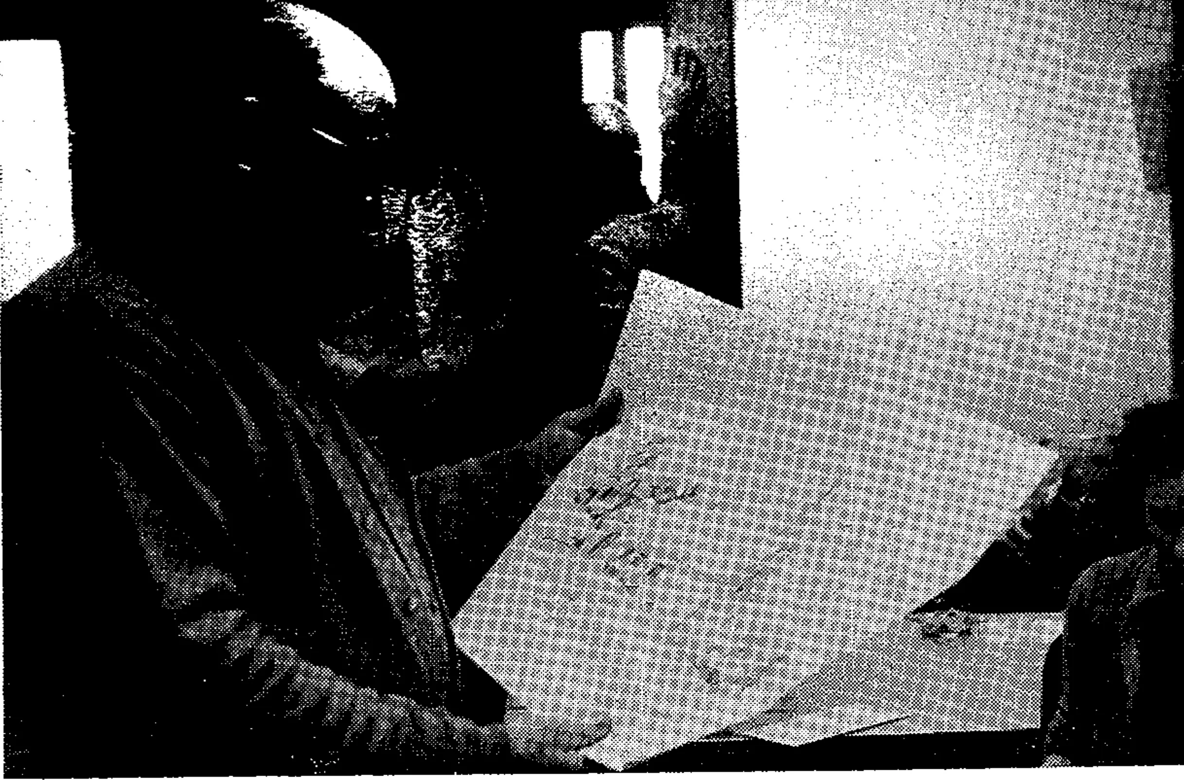 Chairman of the Stratton Mountain Corp. is lumber executive Herbert Smith. Here he studies a painting of the Chapel which is a matter of yards from the base lodge.