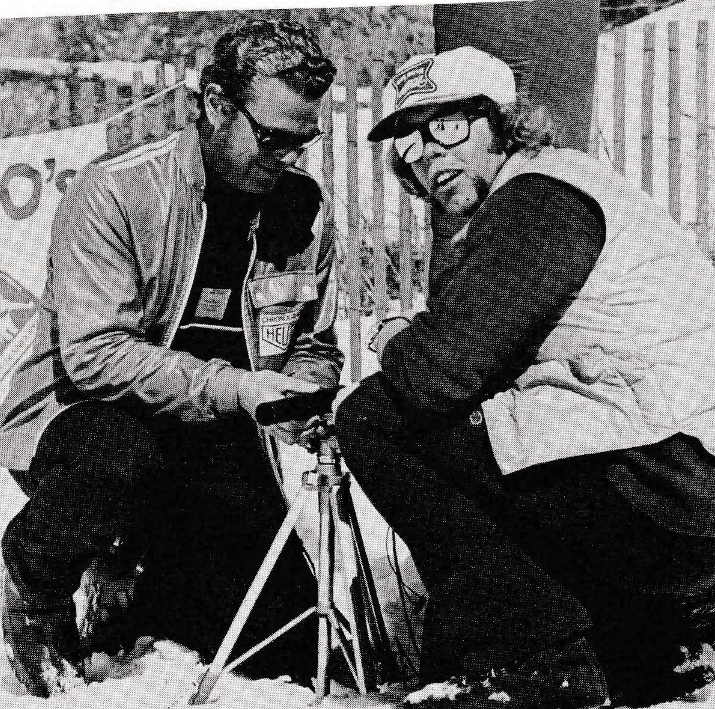 Dick Olmsted of Heuer timing (left) and Erik Hvoslef, ISRA Tournament Director, adjust timing equipment at Steamboat, March 24, 1973.