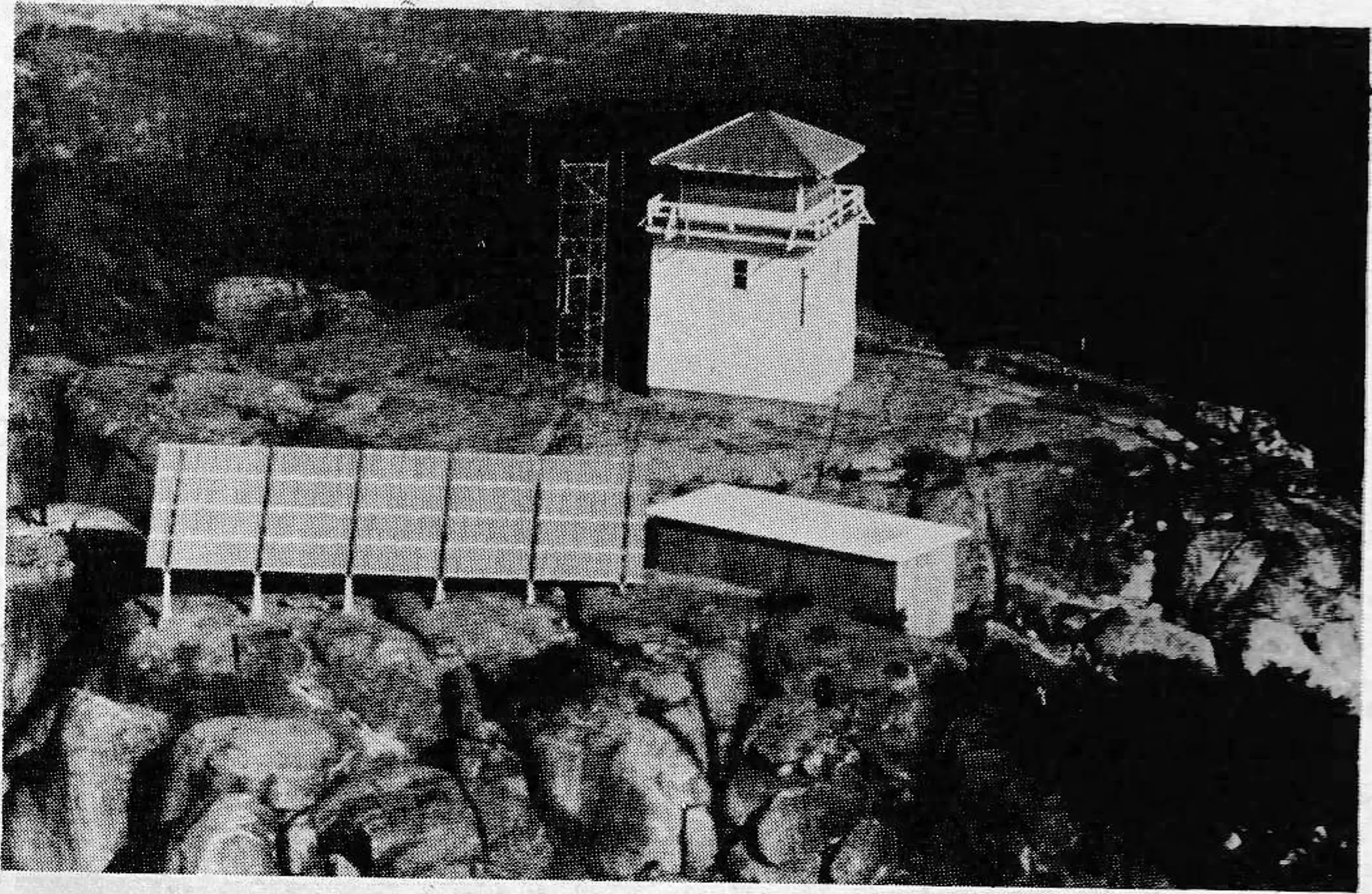 In the future, the direct production of electricity from the sun via photovoltaic cells. Here an array powers a remote communications station.