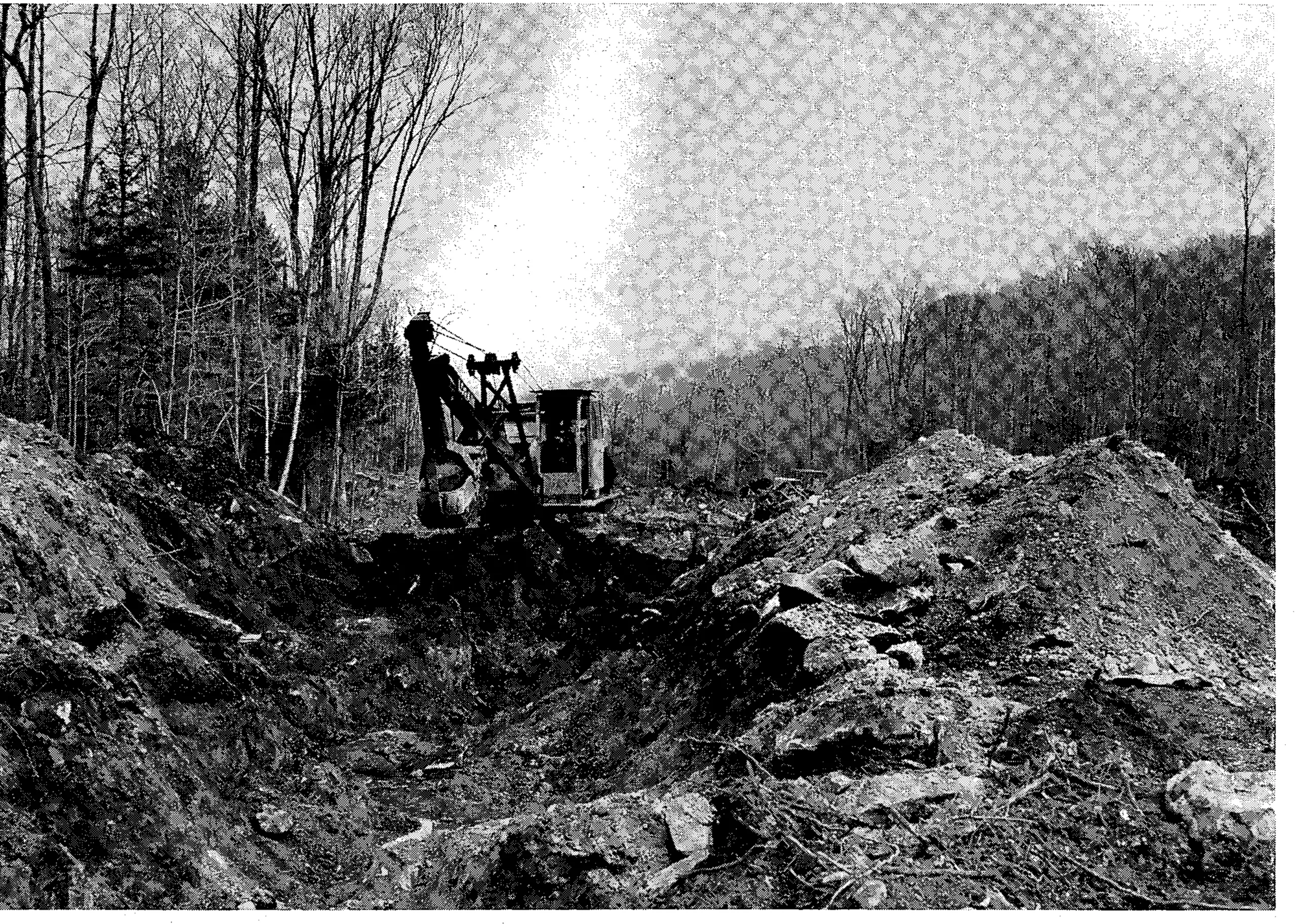 Digging trenches to bury stumps, large rocks and other debris saved money for builders of the Stratton golf course.