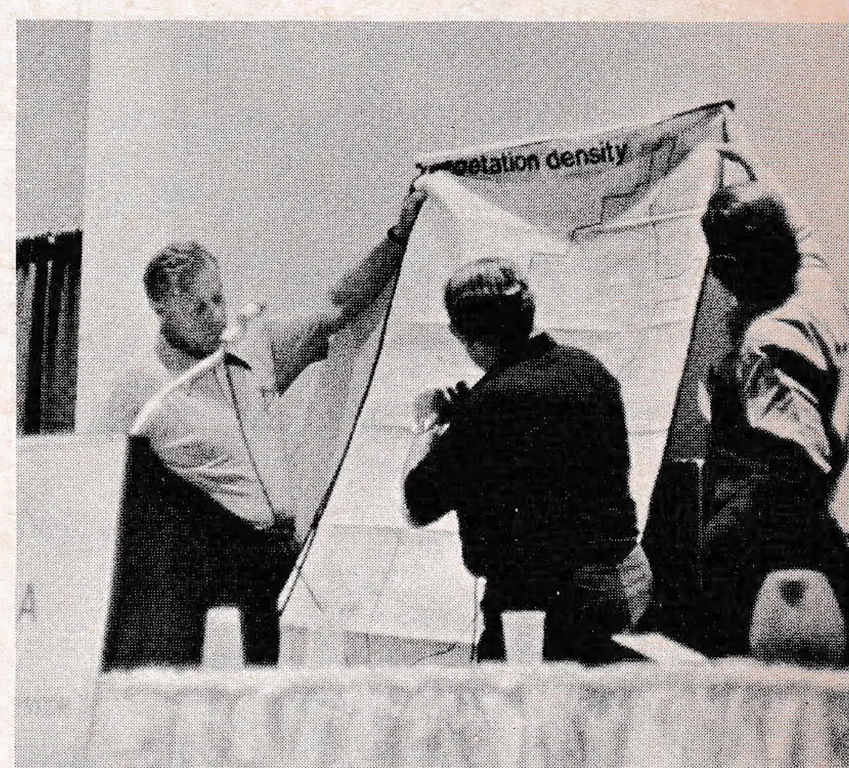 Northstar's Howard West (center) points out resort projections at area planning seminar.