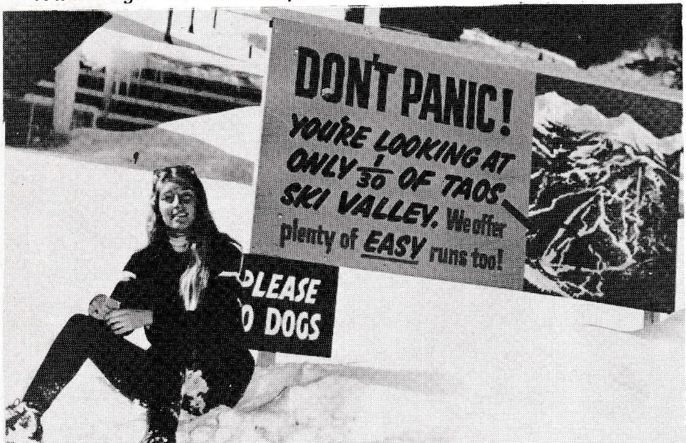 Imaginative treatment of an abstract message, but . . . The woman is posed badly and seems unrelated to the picture. The dog sign could have been removed or covered.