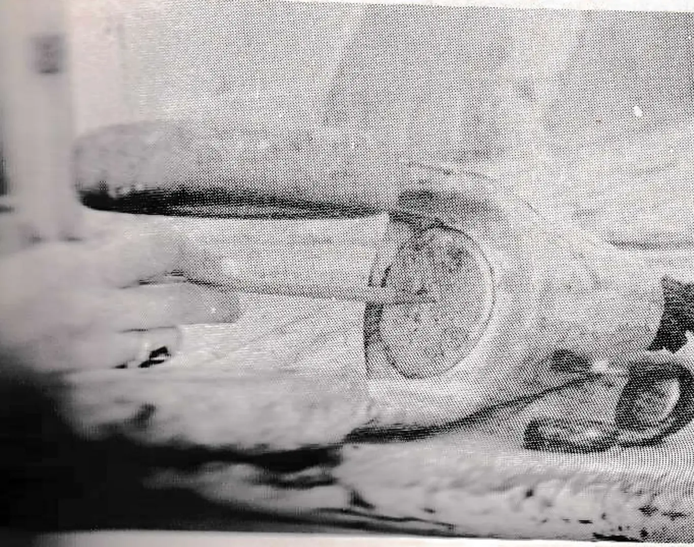 A base of a poured socketed connection showing the “dimple”. The dimple may be the size of a pencil lead or the size of an eraser.