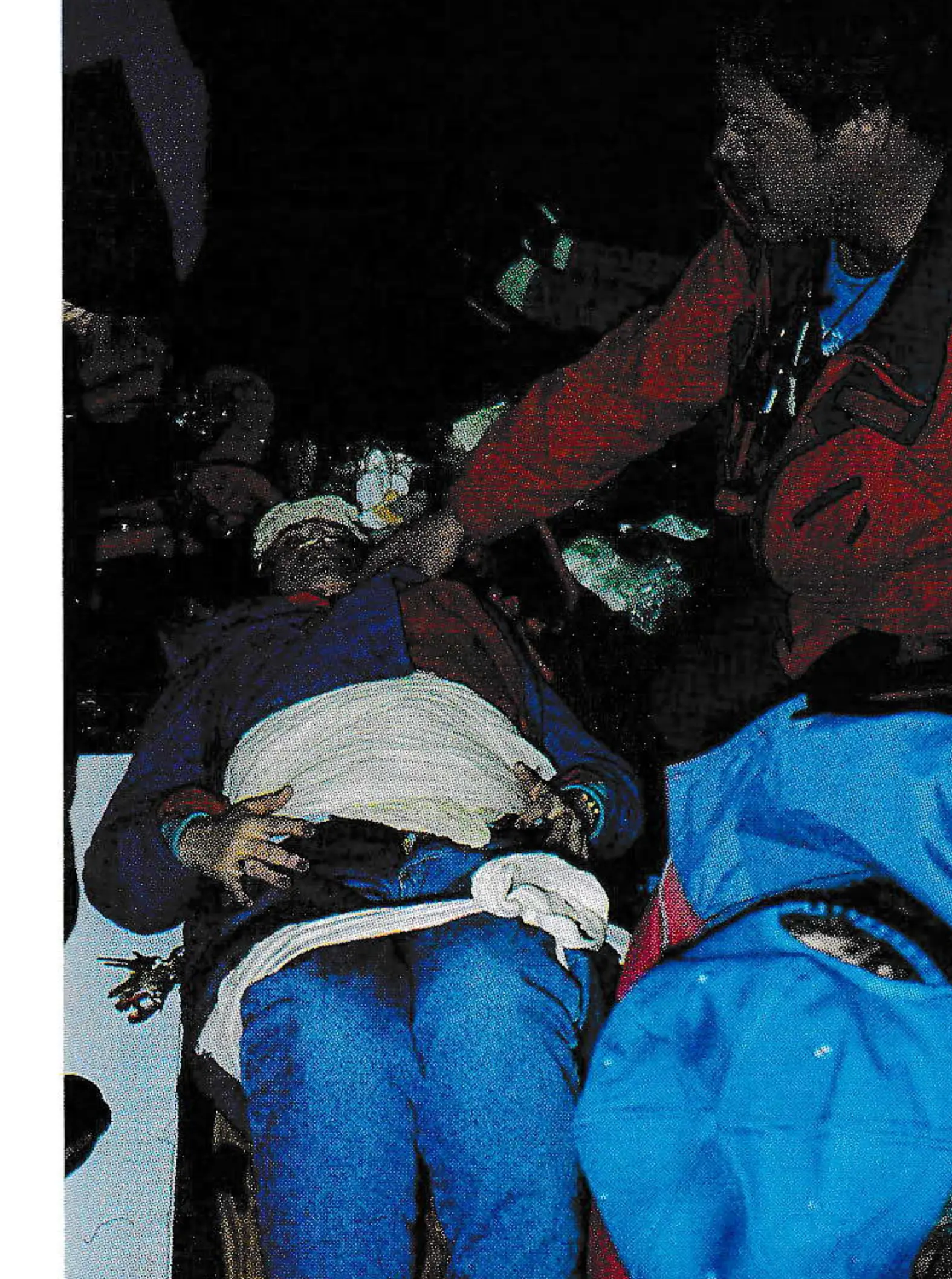 Volunteers (left) had been trained to act like real victims and the ski patrol staff treated them in a realistic manner.