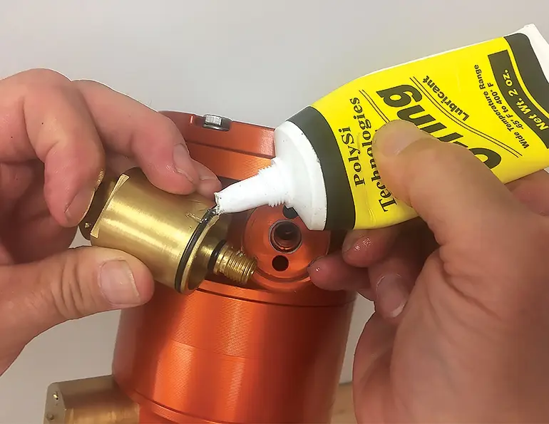 Clean nozzles and O-rings with brush, tip cleaner, compressed air, or water.