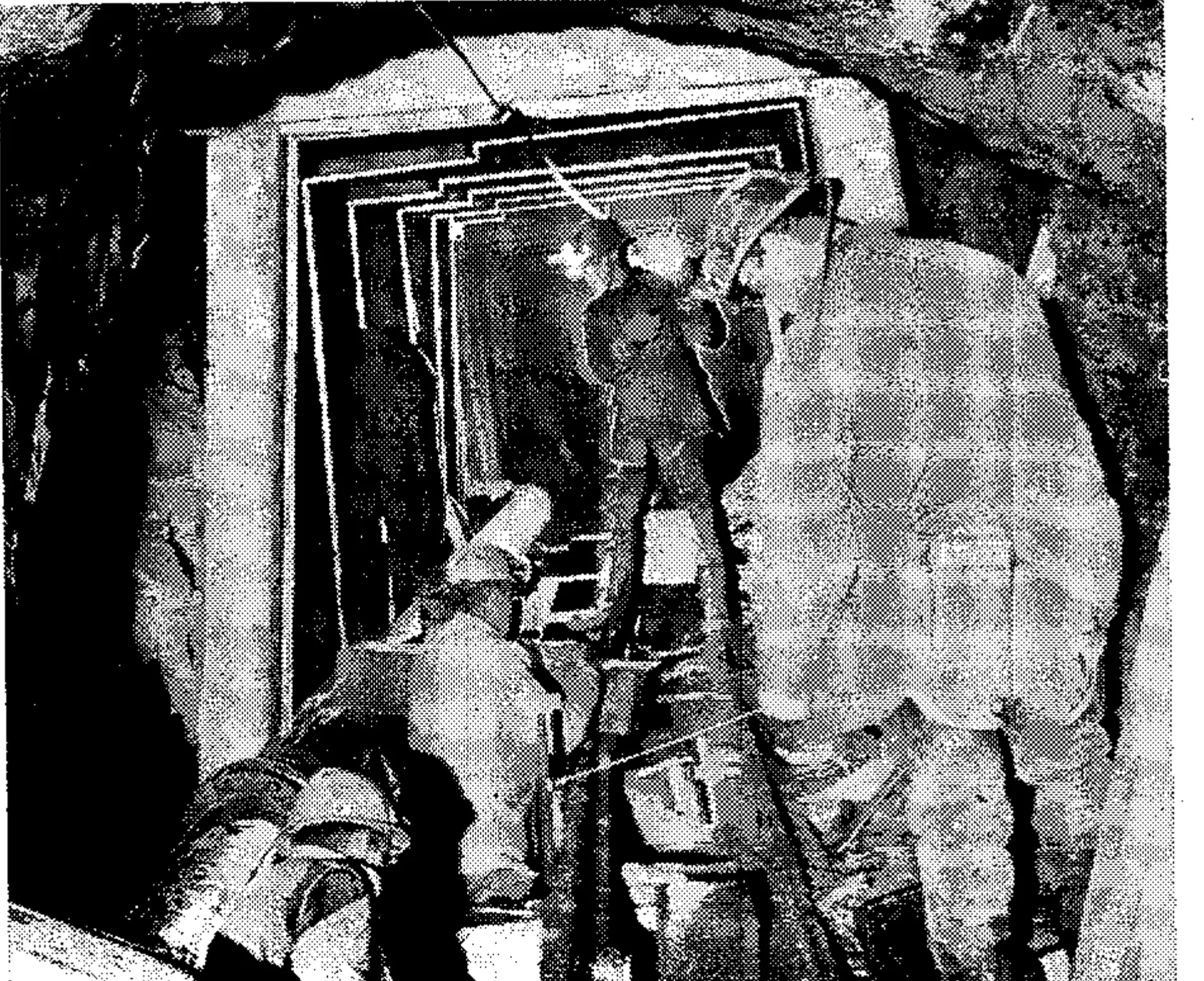 Rails are laid in the old Spiro Tunnel to take the work trains three miles into the heart of the mountains.