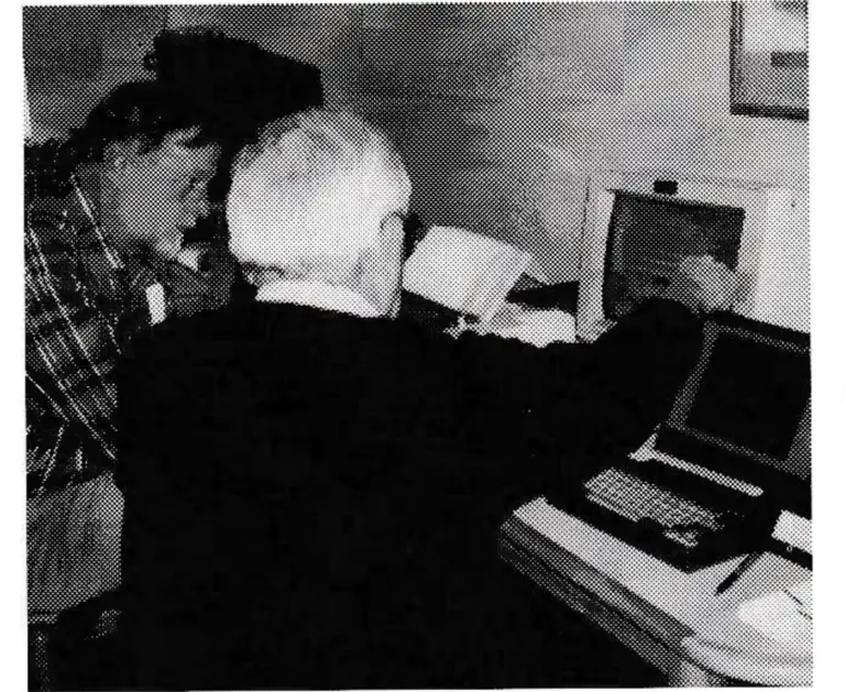 MTAP's Norm Harper demonstrates his maintenance software to Sandy Savage who is in charge of purchasing at Bromley.