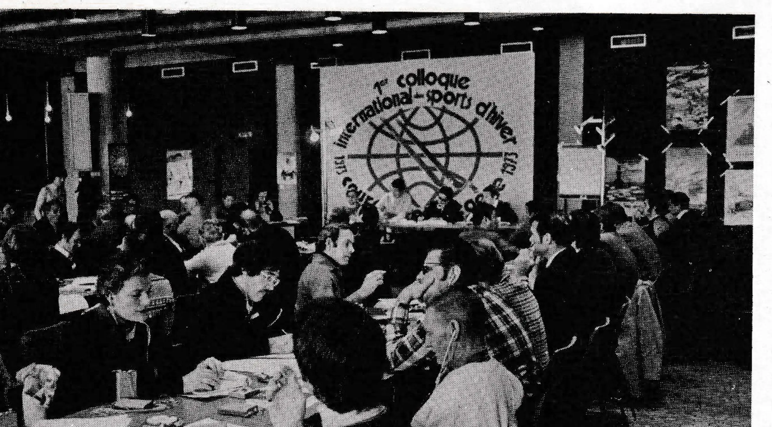 All reports and discussions at the International Winter Sports Symposium were simultaneously translated. North American contingent included Hercule Boulanger (nearest the camera), Mont Sutton, Que; Larry Beidelman, Aspen Skiing Corp. (to his right); Barbara Matthews of Sun Valley (opposite); and Bob Parker of Vail (on her left). Also representing the U.S. was John Fry, of Ski Magazine.