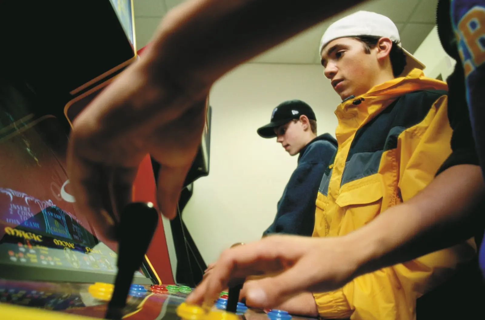 Teenagers absorbed in their own pursuits